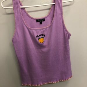 Peachy tank top. Frilled edges.